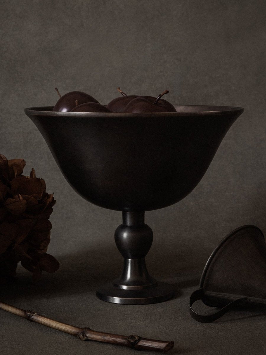 A still life image of the dark bronzed Pavot Bowl on a