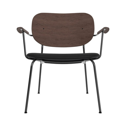 Front view of the Co Lounge Chair with a dark stained oak backrest, black upholstered seat and black steel frame.