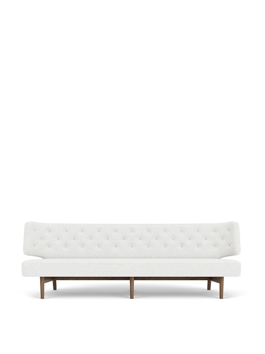 Front view of the Radiohus Sofa, 3-Seater, in light fabric with a tufted backrest and dark wooden legs on a white background.