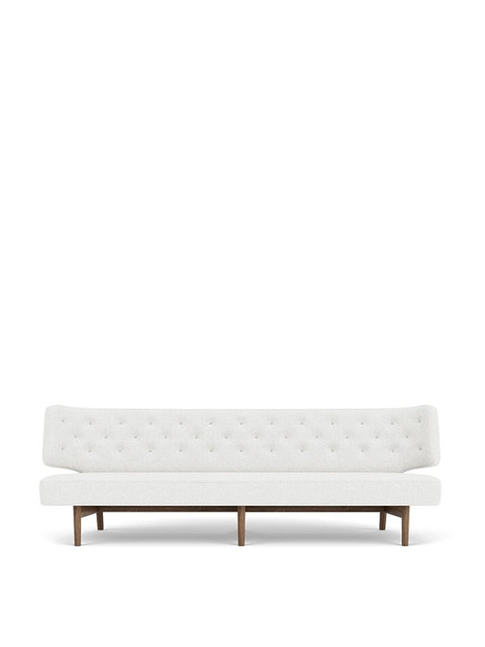 Front view of the Radiohus Sofa, 3-Seater, in light fabric with a tufted backrest and dark wooden legs on a white background.