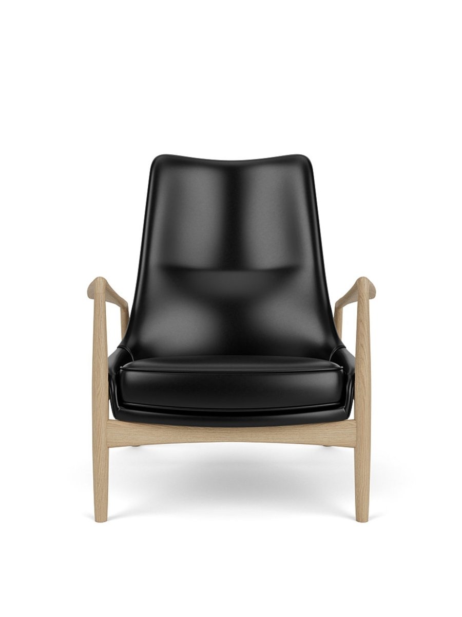 Front view of The Seal Lounge Chair, High Back, upholstered in black leather with a natural oak frame.