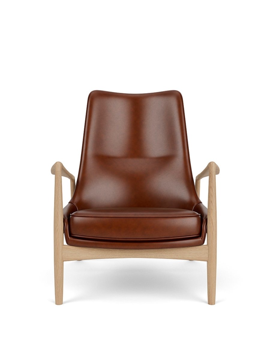 Front view of The Seal Lounge Chair, High Back in natural oak and brown leather, set against a white background.