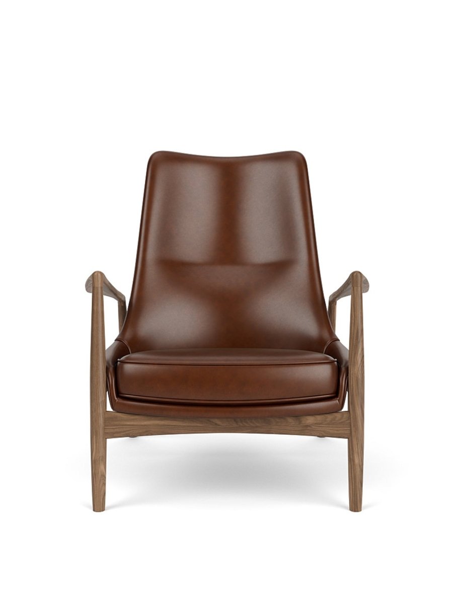 Front view of The Seal Lounge Chair, High Back in oiled walnut and brown leather.