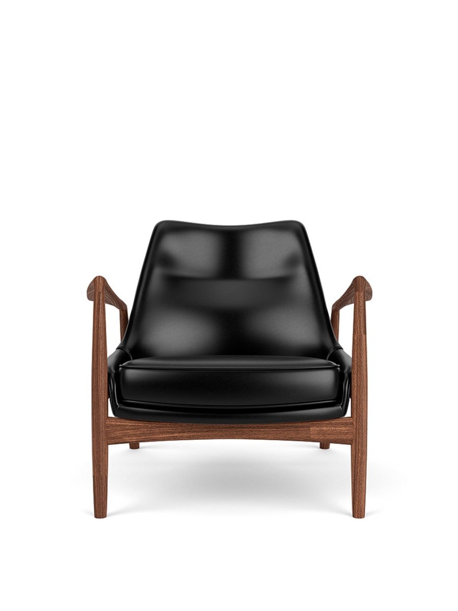 Front view of The Seal Lounge Chair, Low Back in a walnut frame with dark leather upholstery against a white background.
