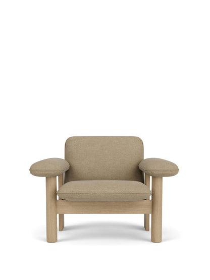 Front view of the Brasilia Lounge Chair, Low Back, in natural oak and Audo Bouclé 02 fabric against a white background.