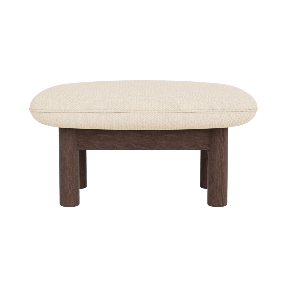 Front view of the Brasilia Ottoman featuring cream bouclé textile upholstery and a sturdy dark stained oak frame.