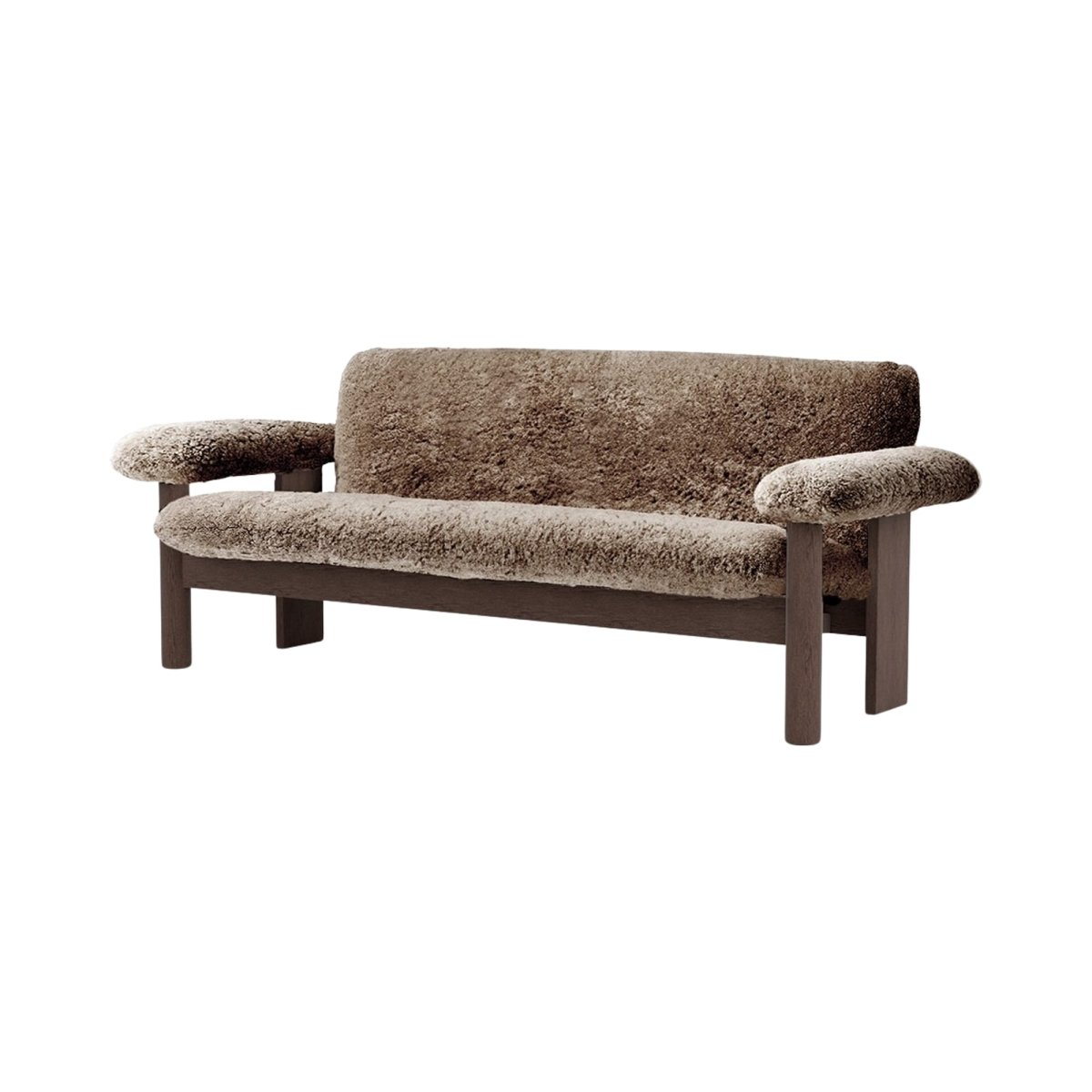 Front view of the Brasilia Sofa upholstered in brown sheepskin with a dark-stained oak frame and rounded armrests.
