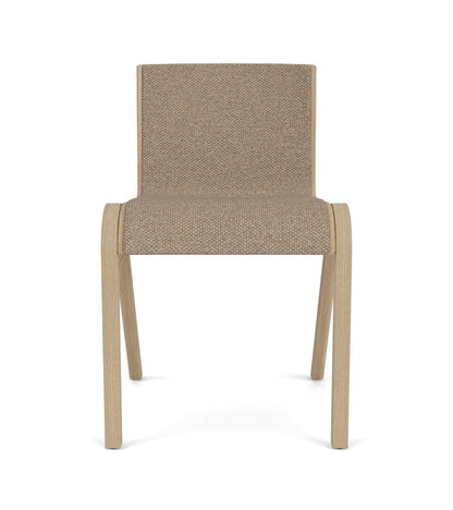 Front view of the Ready Dining Chair, Fully Upholstered, with a natural oak frame and textured Logan Flint fabric.