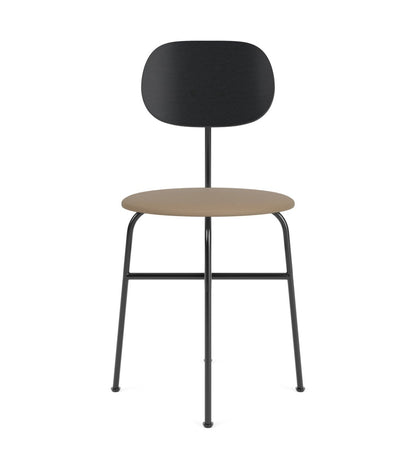 Afteroom Plus Dining Chair with a black oak back and tan Sierra leather upholstered seat, viewed from the front.