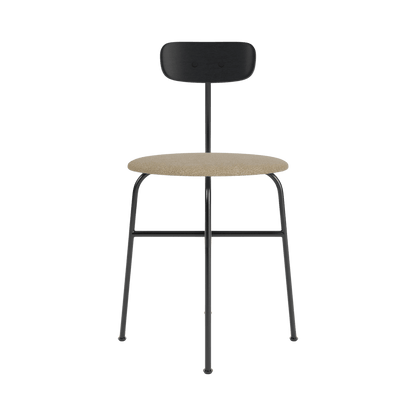 Front view of the Afteroom Dining Chair with a black steel frame, black oak backrest and beige bouclé upholstered seat.