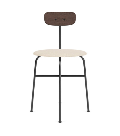 Afteroom Dining Chair with a light upholstered seat, dark oak backrest, and a sleek black steel frame.