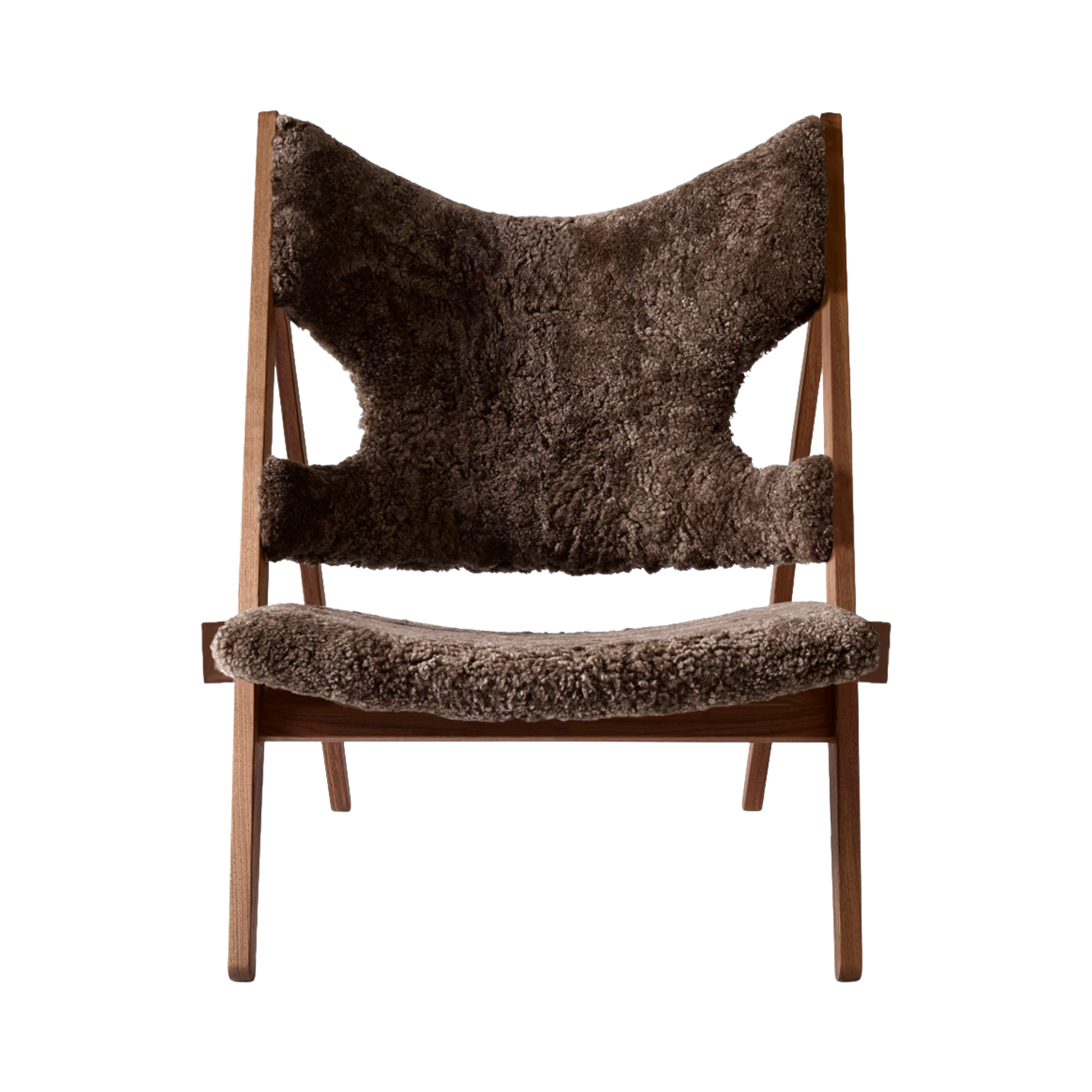 Front view of the Knitting Chair in solid walnut with luxurious root brown sheepskin upholstery.
