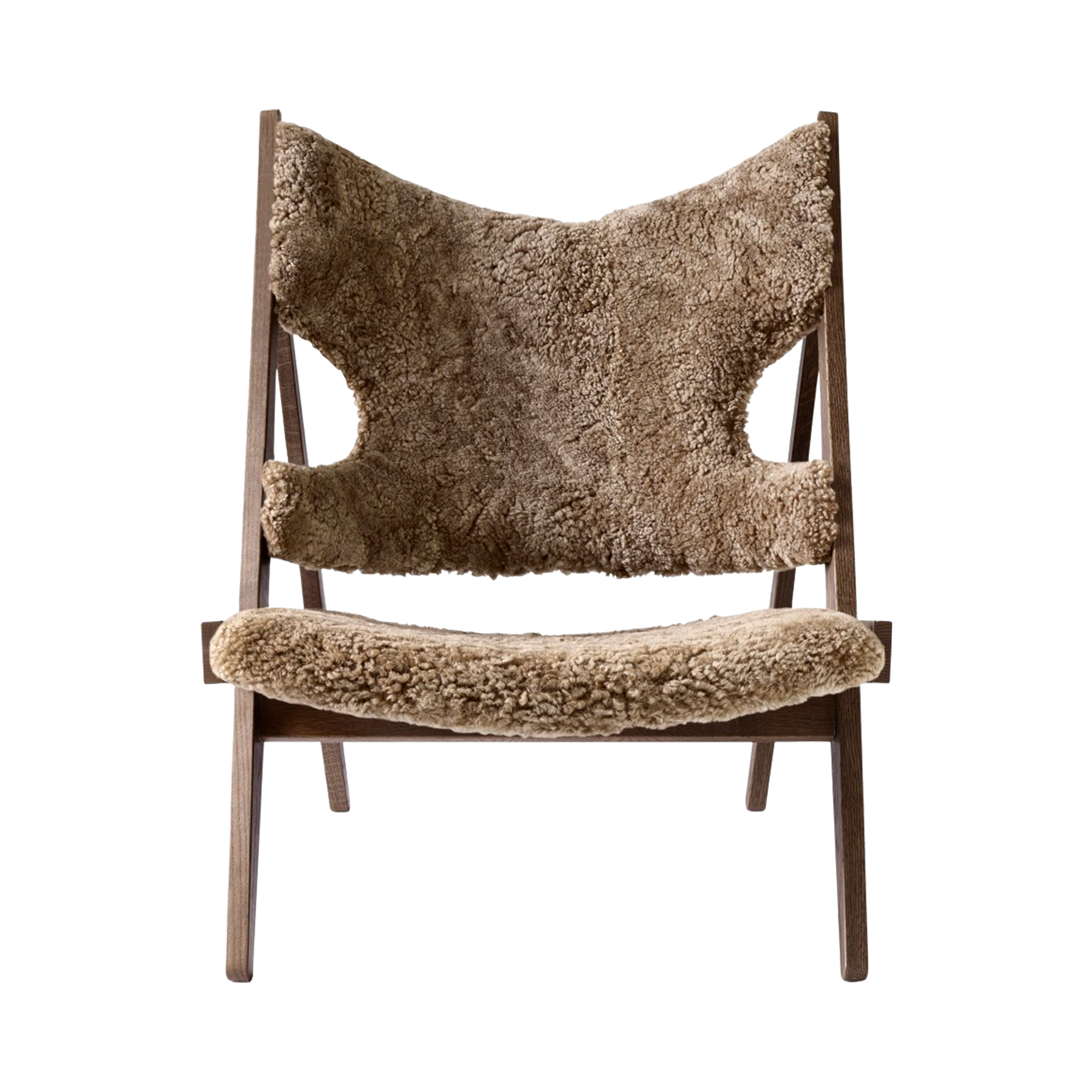 Front view of the Knitting Chair with dark-stained oak frame and Sahara sheepskin upholstery.
