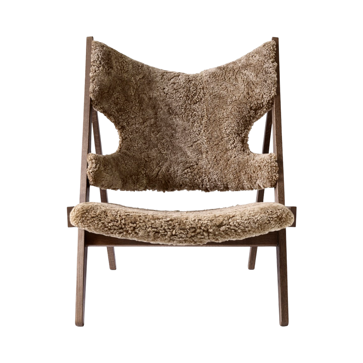 Front view of the Knitting Chair with dark-stained oak frame and Sahara sheepskin upholstery.