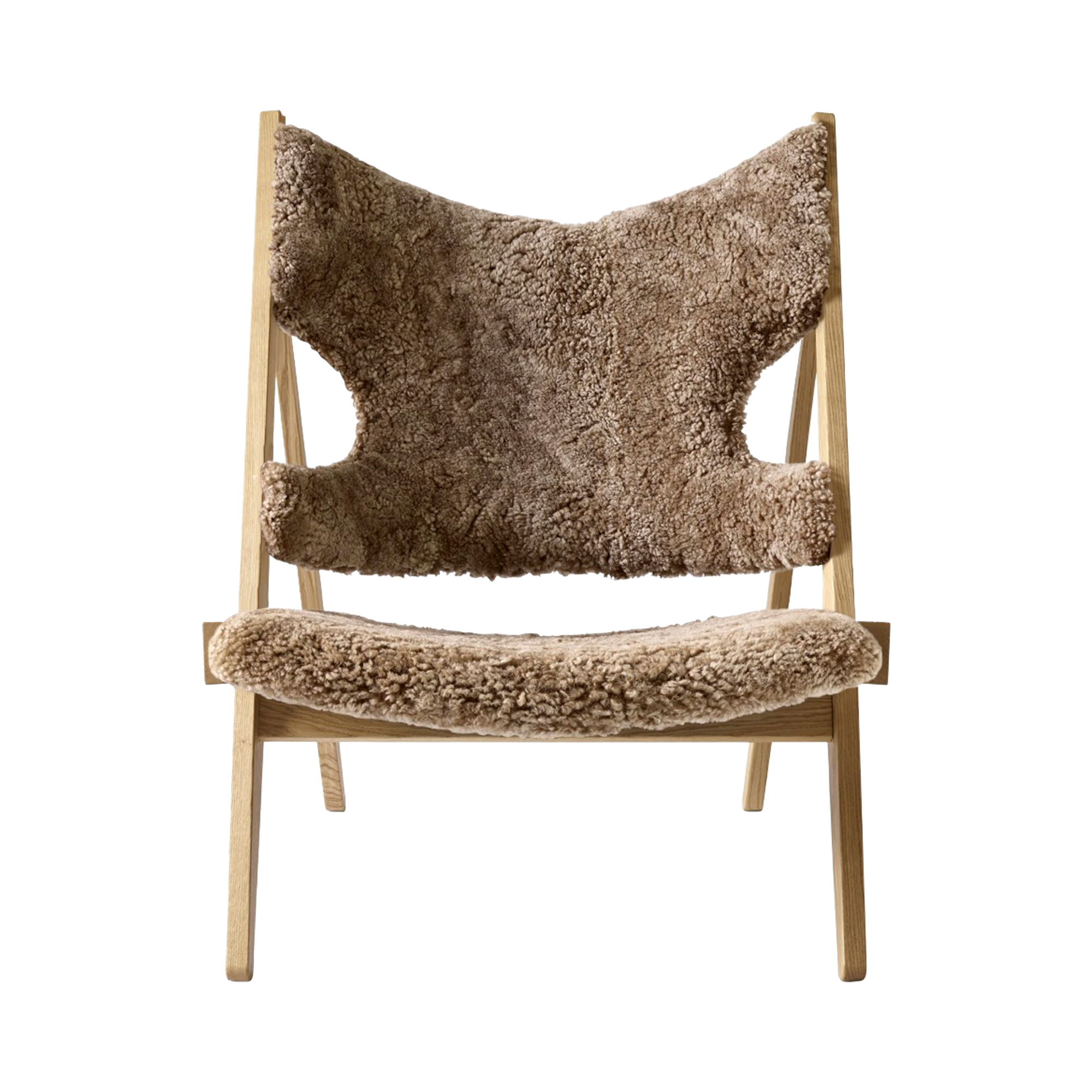 Front view of the Knitting Chair with natural oak frame and Sahara sheepskin upholstery.