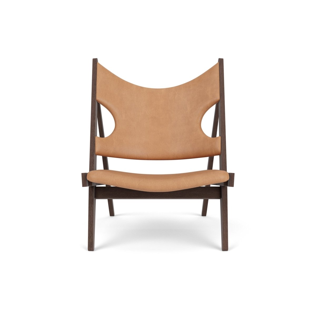 Front view of the Knitting Chair in dark-stained oak with camel leather upholstery, set against a white background.