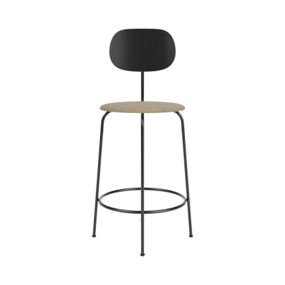 Afteroom Plus Counter Chair with a black painted oak backrest, beige Audo Bouclé seat, and a black steel frame.