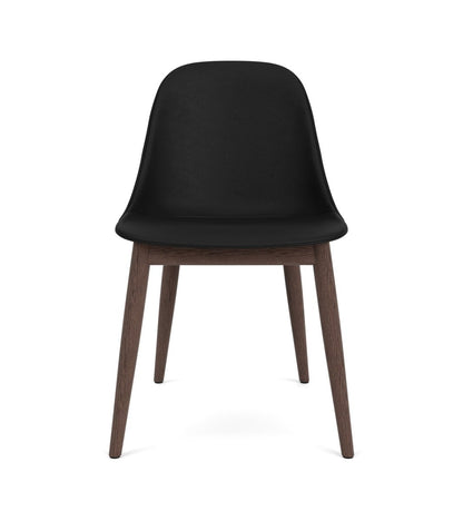 Front view of the Harbour Side Chair, Dining Height, featuring black upholstery and dark-stained oak legs.