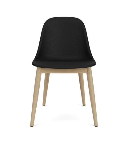 Front view of the Harbour Side Chair, Dining Height, upholstered in black Sierra leather with natural oak legs.