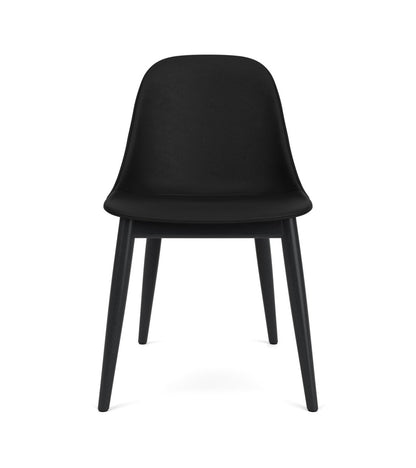 Front view of the Harbour Side Chair, Dining Height, with black Sierra leather upholstery and black-painted oak legs.