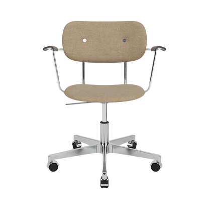 Fully upholstered Co Task Chair in beige Audo Bouclé 02 with dark stained oak arms and a chrome swivel base with casters.