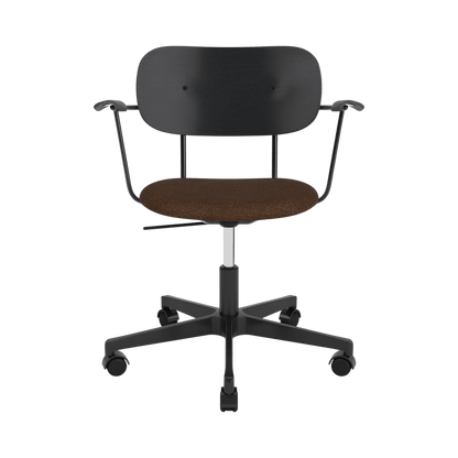 Co Task Chair featuring a brown Bouclé seat, black painted oak backrest, and a black swivel base with casters.