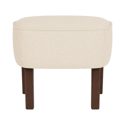 Front view of the Ingeborg Ottoman upholstered in light beige fabric with dark smoked oak wooden legs.