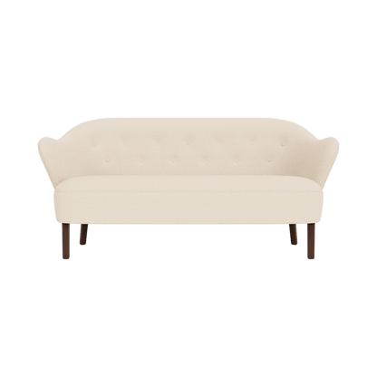 Ingeborg Sofa in Logan Jasmine fabric with smoked oak legs, shown from the front against a clean background.