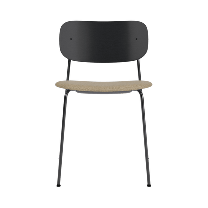 Co Dining Chair without arms featuring a black painted oak back and a beige Audo Bouclé 02 upholstered seat.