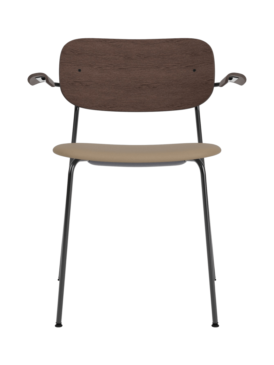 Co Dining Chair with arms in dark stained oak and Sierra 1611 Stone leather upholstery with a black steel frame.