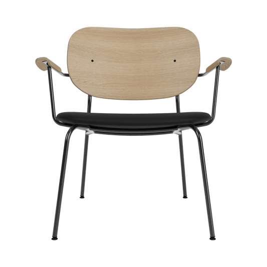 Front view of the Co Lounge Chair featuring a natural oak backrest and black Sierra 1001 leather upholstered seat.