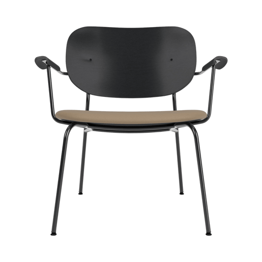 Co Lounge Chair with a black painted oak backrest, tan Sierra 1611 upholstered seat, and a slender black steel frame.
