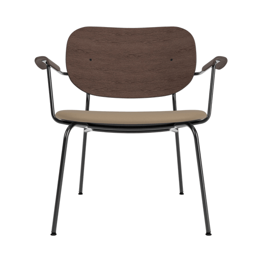 Front view of the Co Lounge Chair with a dark stained oak backrest, tan Sierra 1611 seat, and black steel frame.