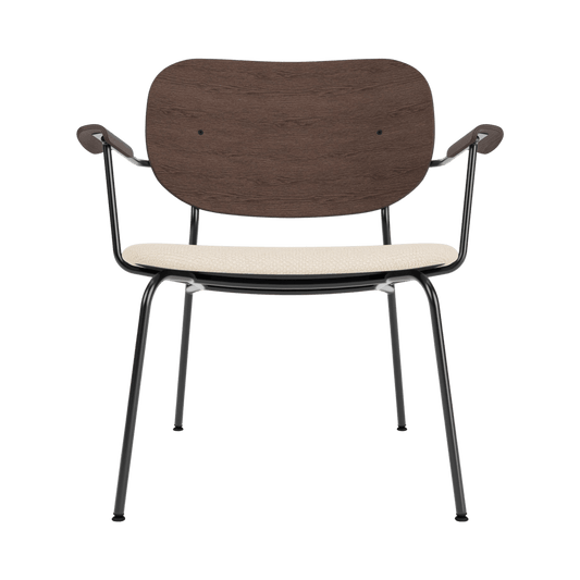Front view of the Co Lounge Chair, Partially Upholstered in Logan Jasmine with a dark stained oak backrest.