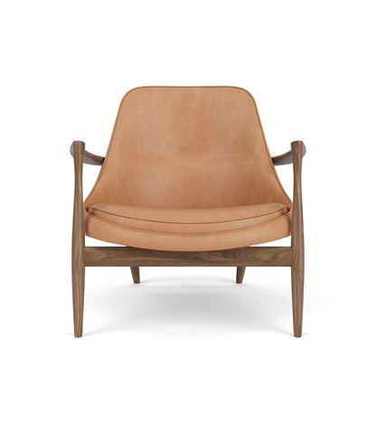 Elizabeth Lounge Chair in oiled walnut with camel leather upholstery, viewed from the front against a white background.
