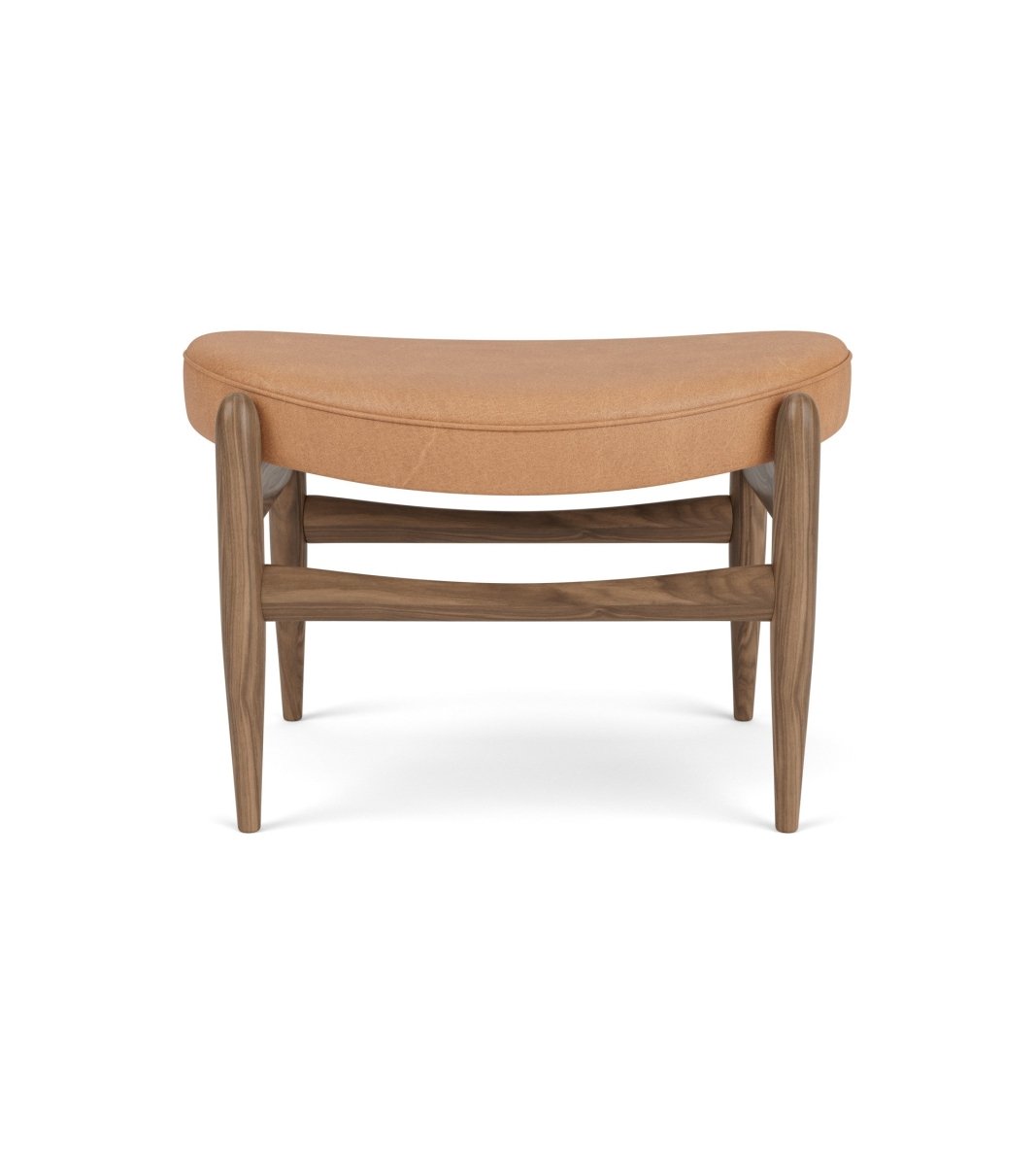 Elizabeth Ottoman in walnut with a curved camel leather seat, shown from the front on a white background.