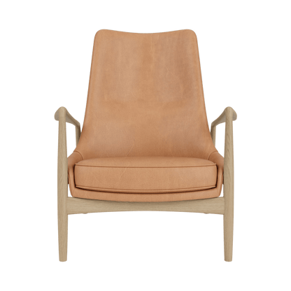 Front view of The Seal Lounge Chair, High Back in camel leather and natural oak.