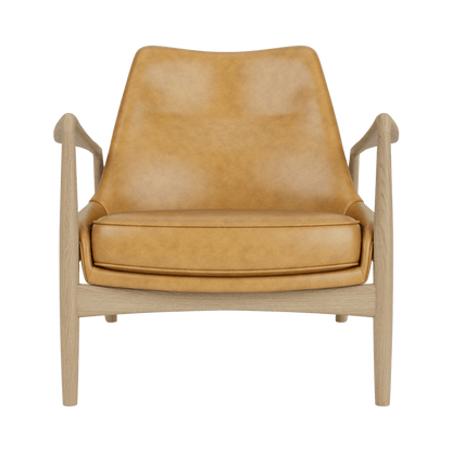 Front view of The Seal Lounge Chair, Low Back in natural oak with tan leather upholstery against a white background.