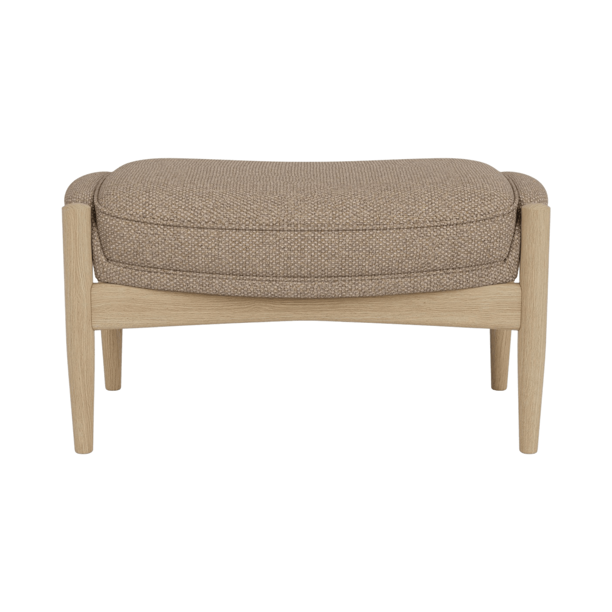 The Seal Ottoman in Logan Flint upholstery with a natural oak finish, featuring an organic form and wooden legs.