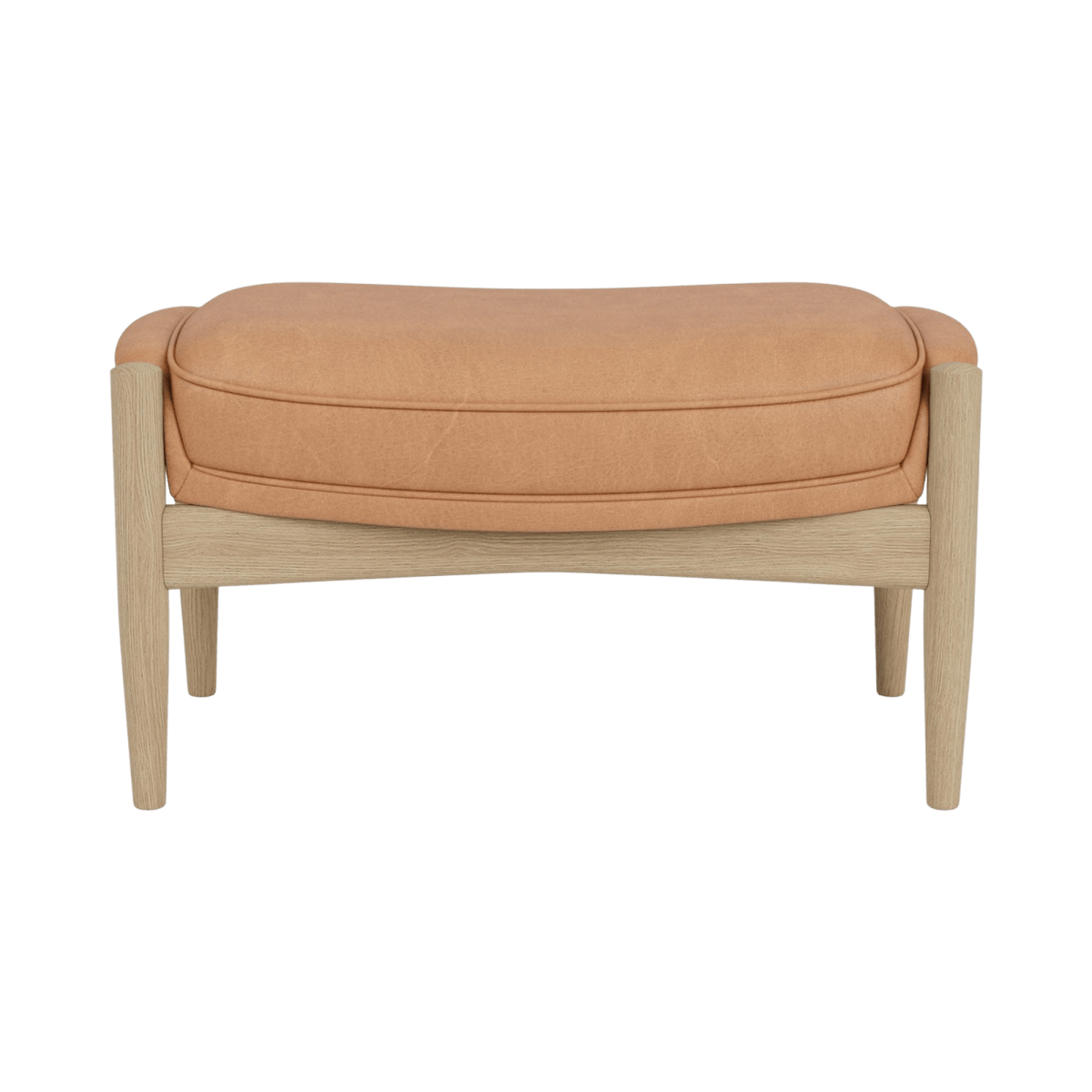 The Seal Ottoman upholstered in camel leather featuring a natural oak wooden frame against a solid white background.
