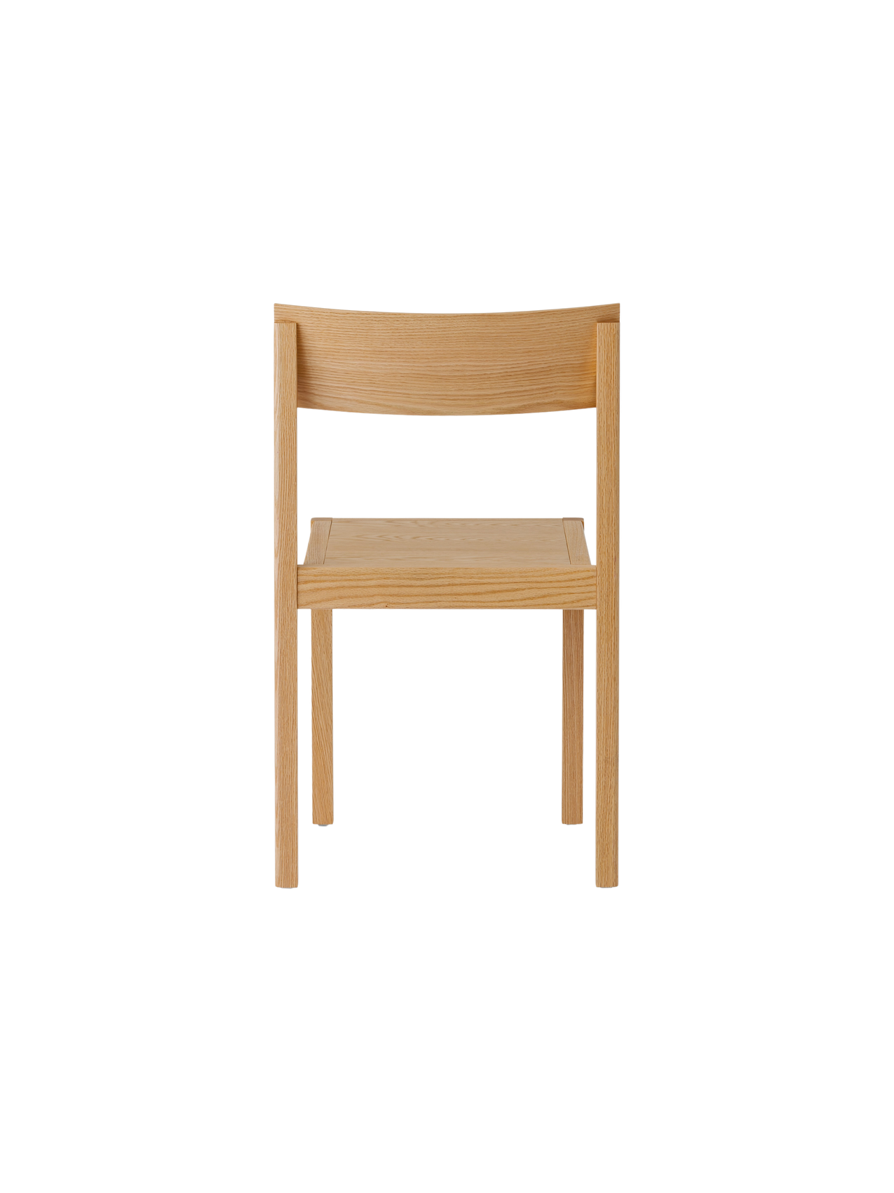 Mauro Dining Chair in natural oak, back view, showing its solid wood frame and form-pressed veneer backrest.
