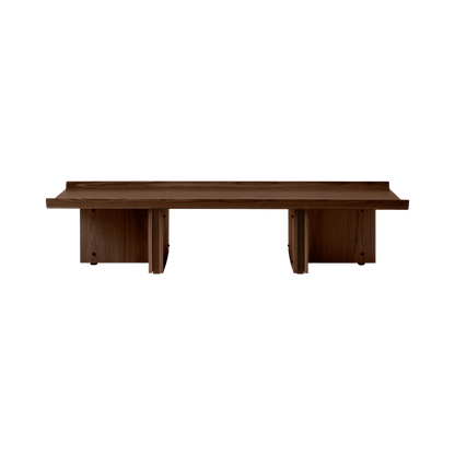 Front view of the Conrad Lounge Table in dark stained oak, with Japanese-inspired upward-curving tabletop edges.