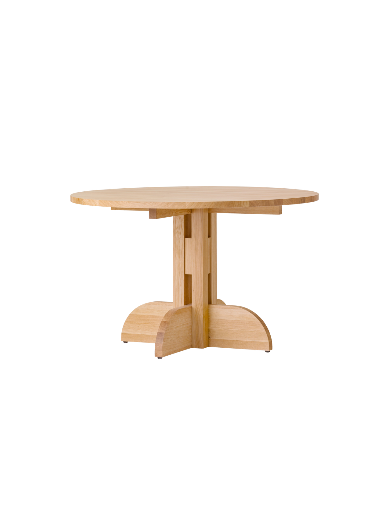 Puffin Dining Table in natural solid oak with a round top and architectural base, isolated on a white background.