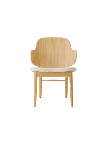 The Penguin Wooden Lounge Chair in natural oak with a light beige textured upholstered seat, seen from the front.