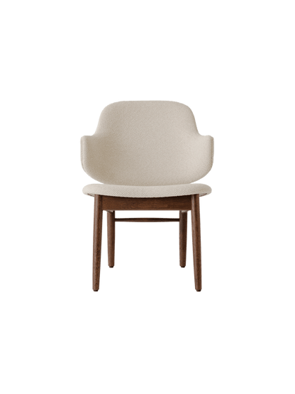 The Penguin Wooden Lounge Chair featuring a dark-stained oak frame and light beige Logan fabric upholstery.