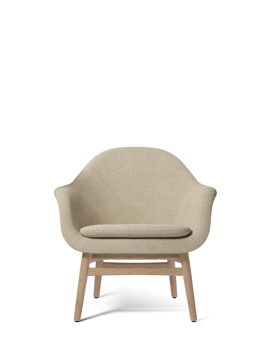 Front view of the Harbour Lounge Chair with a natural oak frame and textured Audo Bouclé 02 upholstery.