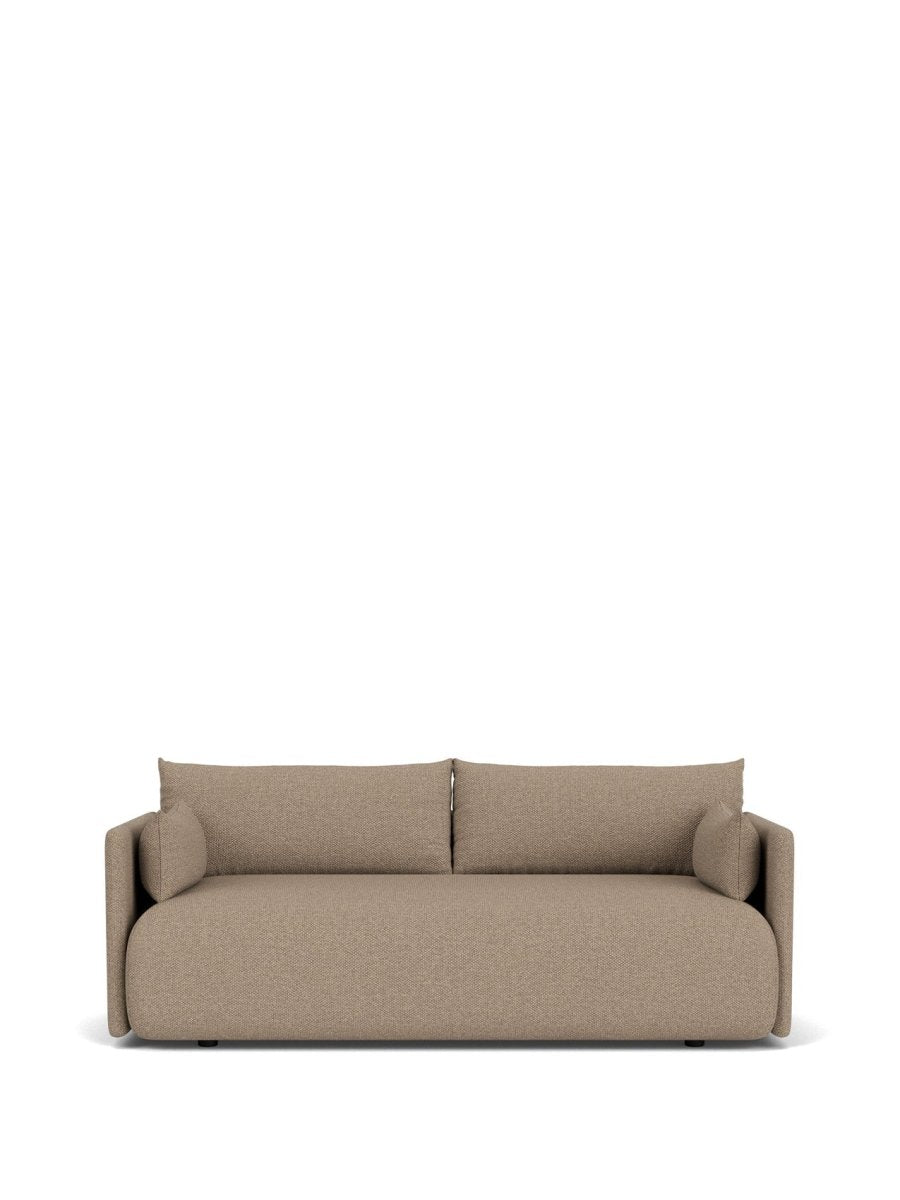 Beige upholstered two-seater sofa with rounded base, low square arms and two back cushions, fabric texture visible