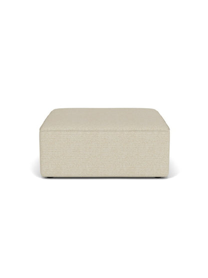 Front-on studio shot of the Eave Sectional Pouf, a modular rectangular ottoman in light beige Savannah 202 textured fabric.