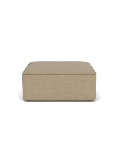 Front view of the Eave Sectional Pouf, a rectangular ottoman upholstered in beige bouclé fabric on a white background.