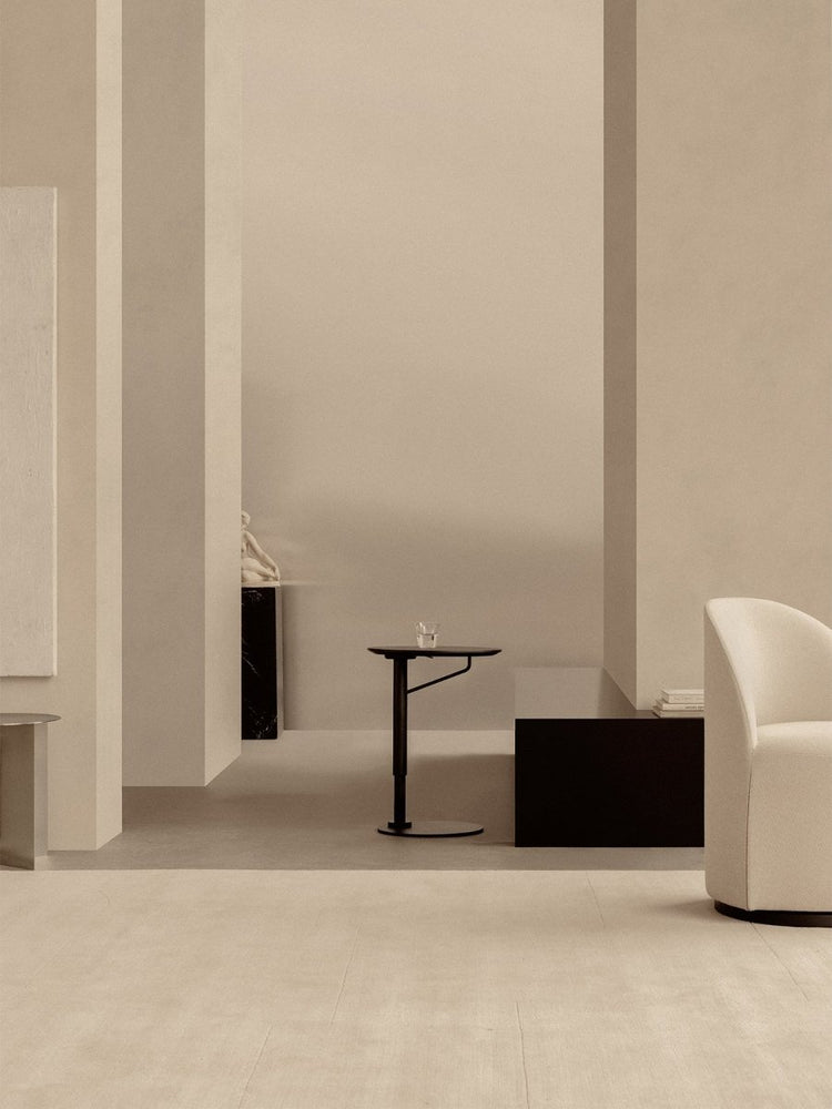 A Branch Side Table in dark stained oak in a minimalist room with Tearoom Side Chair, Androgyne Side Table, and Plinth Tall.